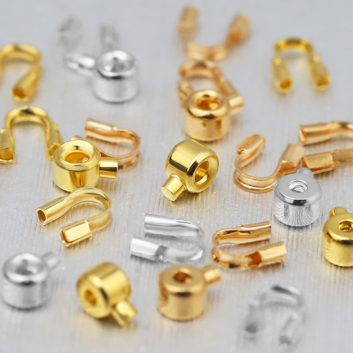 20 個の位置決めビーズ銅鋼ゴールドカラーワイヤープロテクタ - Jewelry Making Loops のレビューと価格